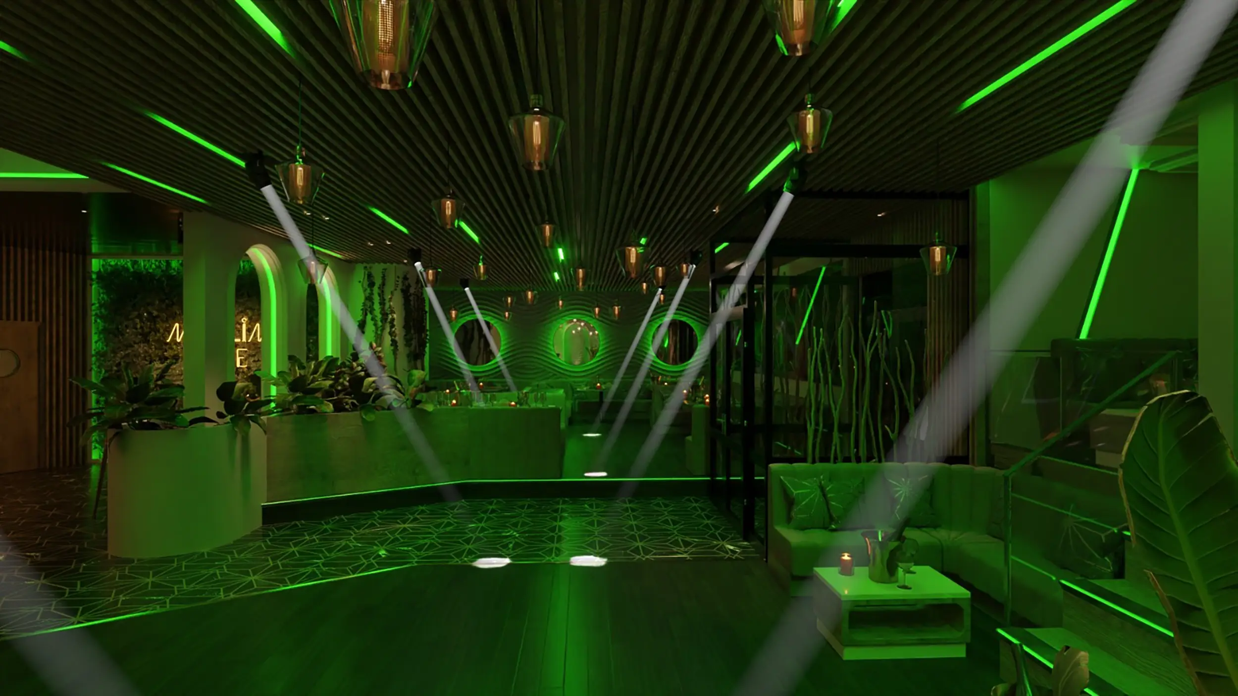 Salle avec des lumières vertes de l'Estival. C'est un restaurant et bar en Seine-Maritime aménagé par le Groupe Silam.
